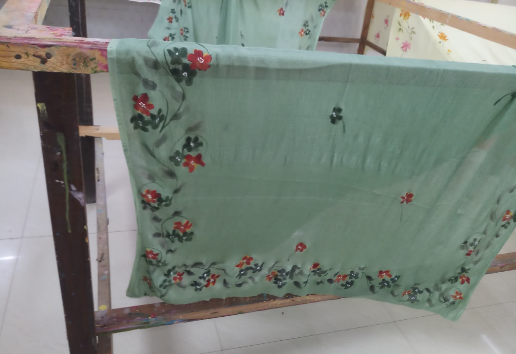 Green saree with floral painting on frame